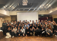 社員総会での集合写真（社員+インターン生）