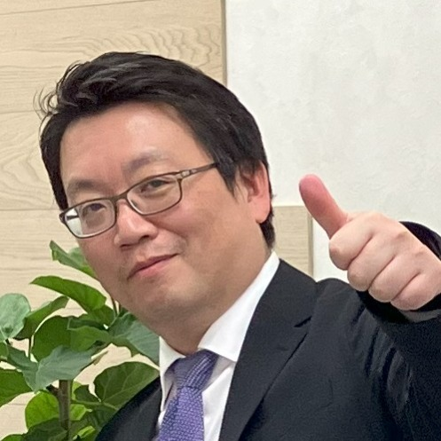 富田 永治