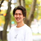 長 拓也