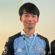 安達 健二