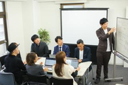 会議中…