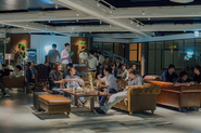 Open office and regular all-hands-meetings in our Auditorium
