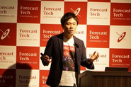 2019年末開催した「Forecast Tech」のカンファレンスの様子（代表取締役社長 関洋二郎）