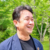 足立 龍男