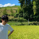 南 健一