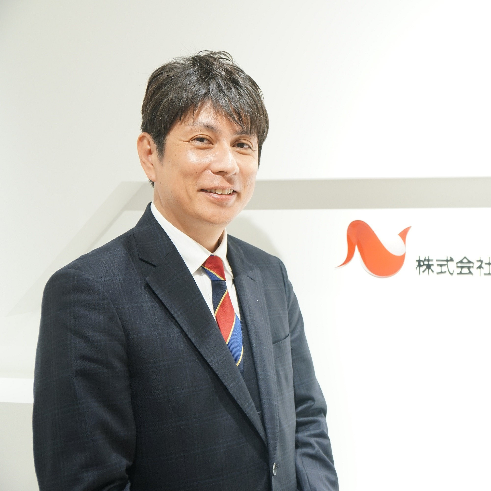 及川 智正