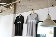 過去の社内プロジェクトで制作したTシャツ。デザインは社内コンペで決まりました。