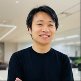 梁 毅