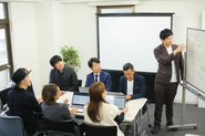 会議中…