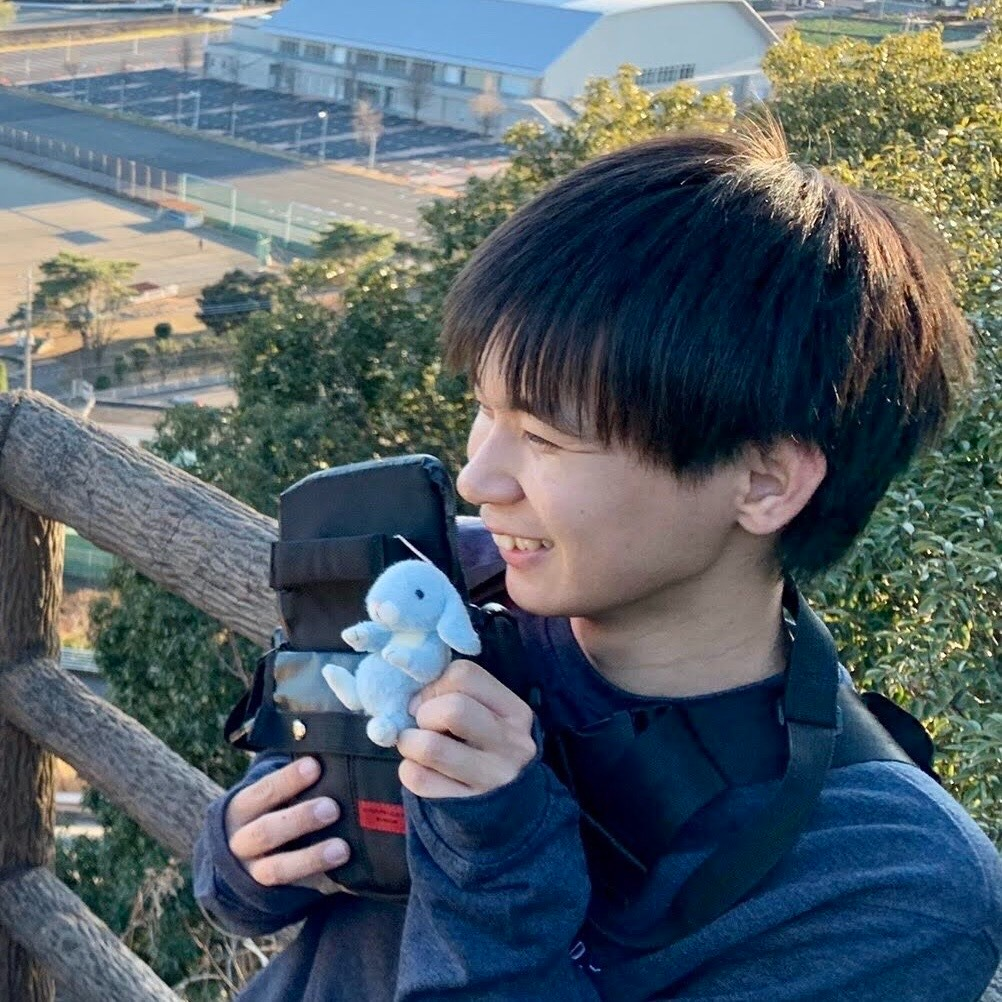 新津 健太
