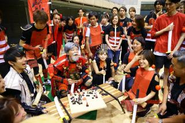 世界観を創り、大人が本気で打ち込みチームビルディングを行う