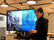 ビジョンを語るCEOの栄藤稔