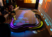 XR技術で従来の「玩具」体験を拡張。写真は2021年11月に公開されたミニ四駆デジタルサーキット