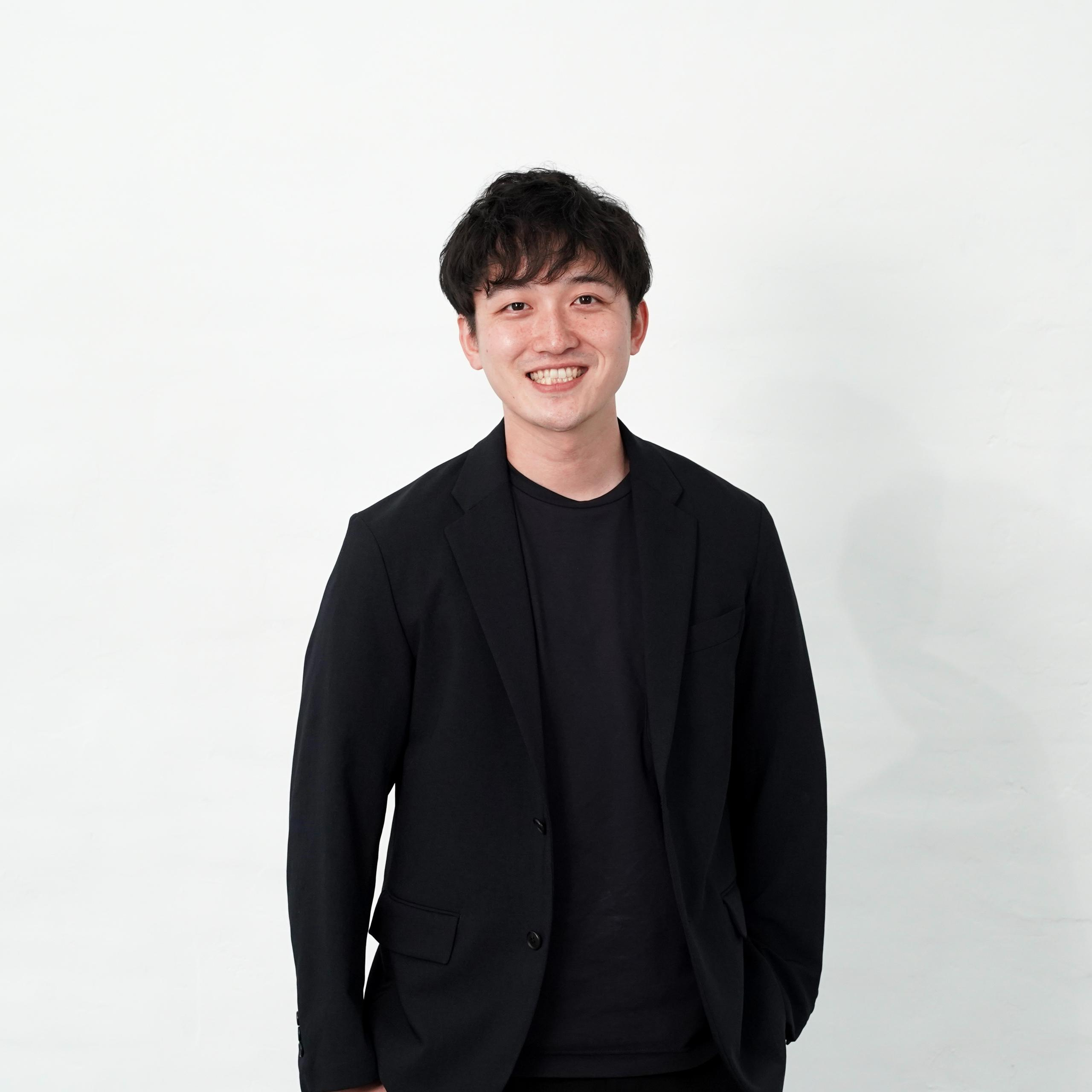 間仁田 賢