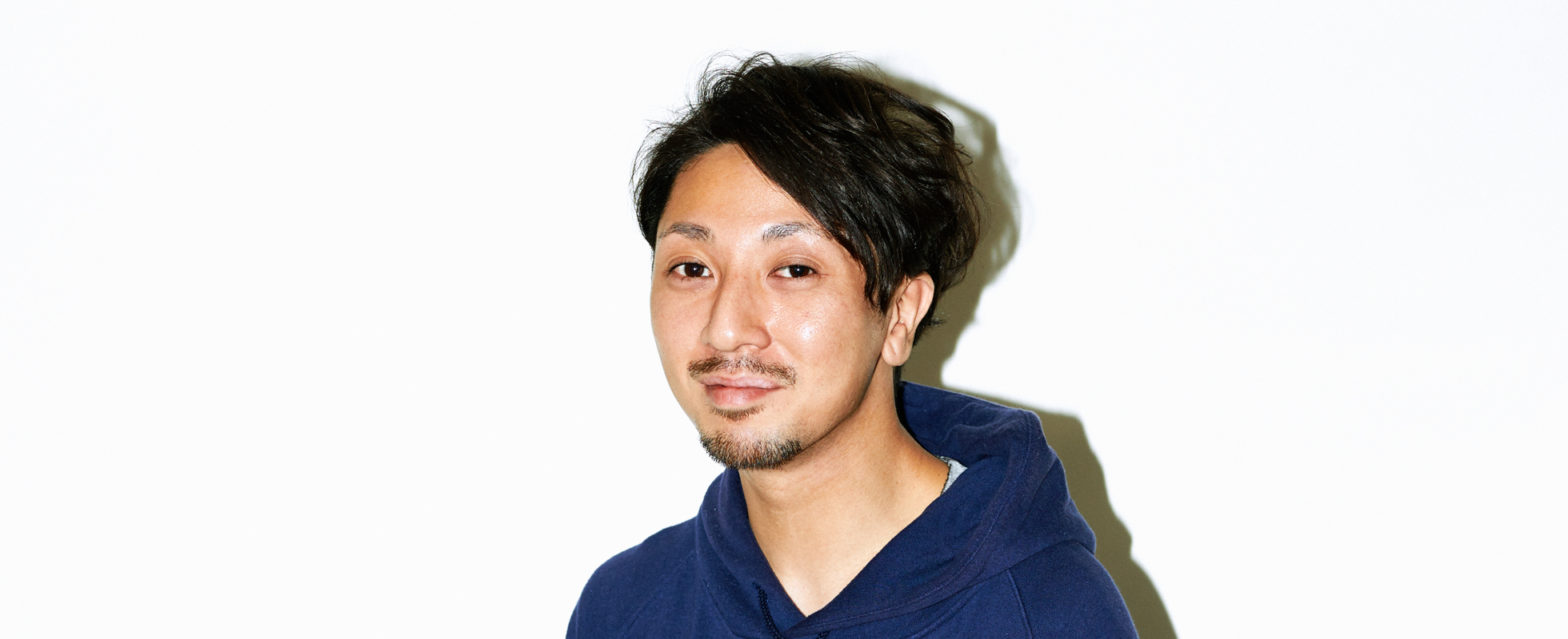 【社員紹介vol.2】DJを志した青年が、時代を創るアートディレクターになるまで