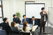 会議中…